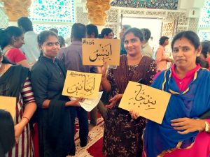 12-Happy-ladies-with-their-calligraphy-boards.