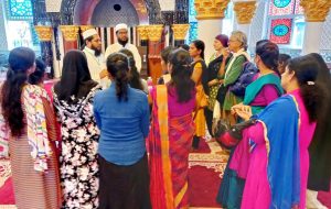 5-Mosque-Tour-Guide-Sheikh-Naizer-with-a-motley-group-of-visitors